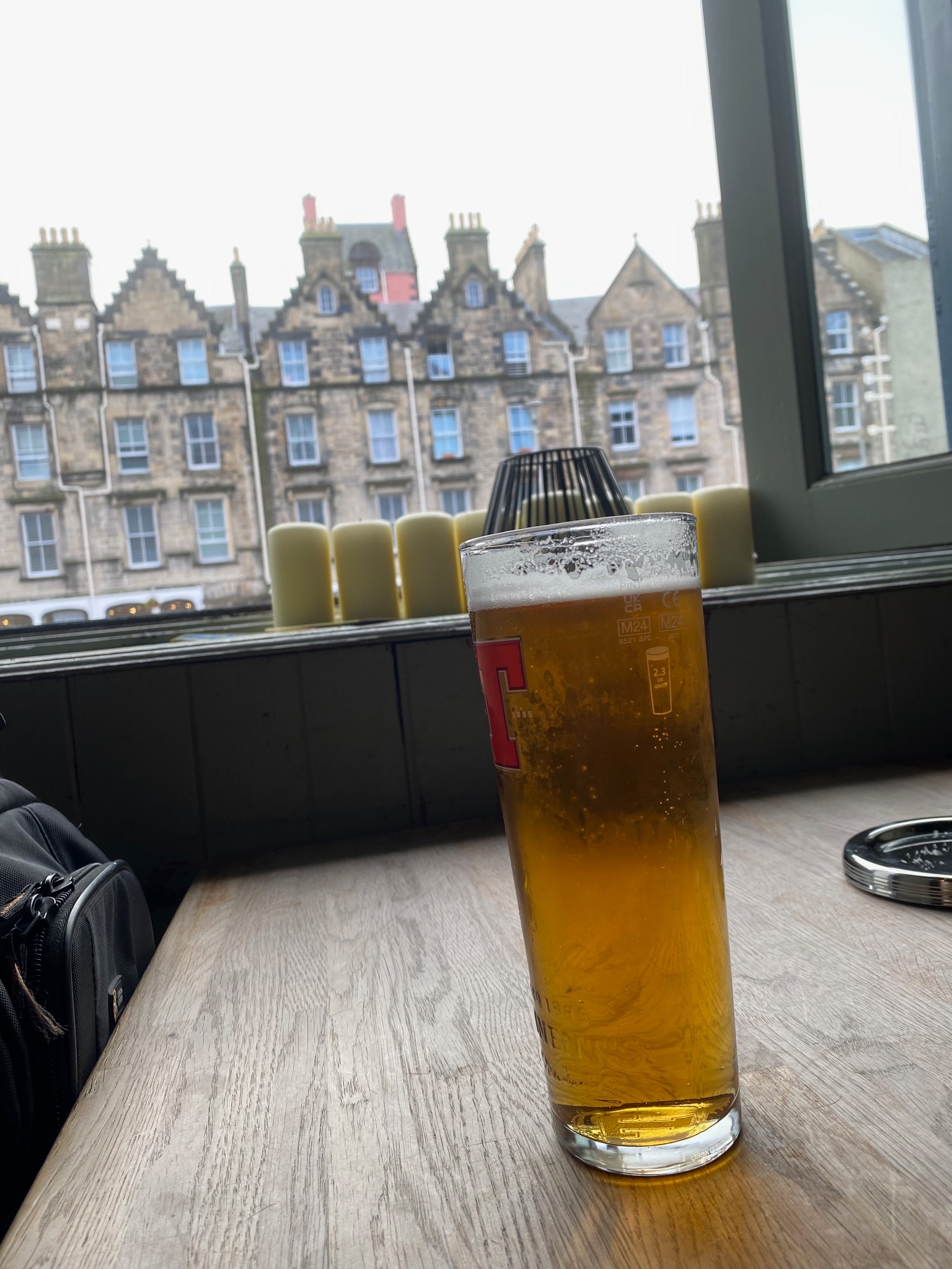 A pint of Scottish lager on a table in an Edinburgh pub 